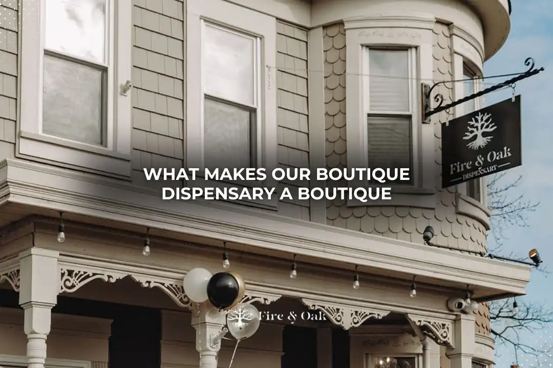 Exterior view of Fire & Oak boutique dispensary showcasing architectural details and a sign, highlighting its unique offerings and inviting atmosphere.